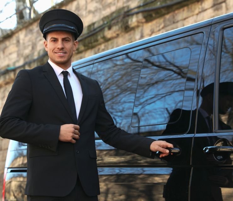 Professional driver near luxury car outdoors. Chauffeur service